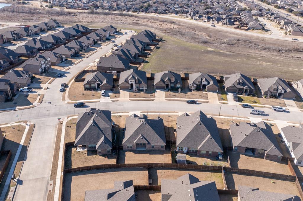 312 Eagle Ridge Road Forney, TX 75126 - Photo 28 of 39 an aerial view of a livingroom with furniture and kitchen view