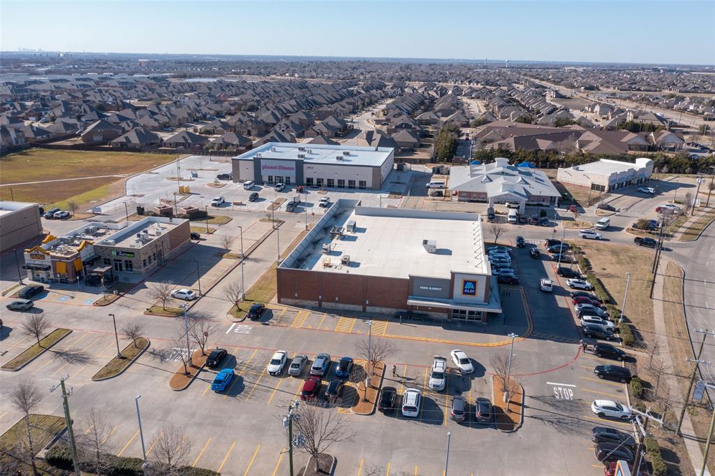 312 Eagle Ridge Road Forney, TX 75126 - Photo 35 of 39 an aerial view of a house with a ocean view