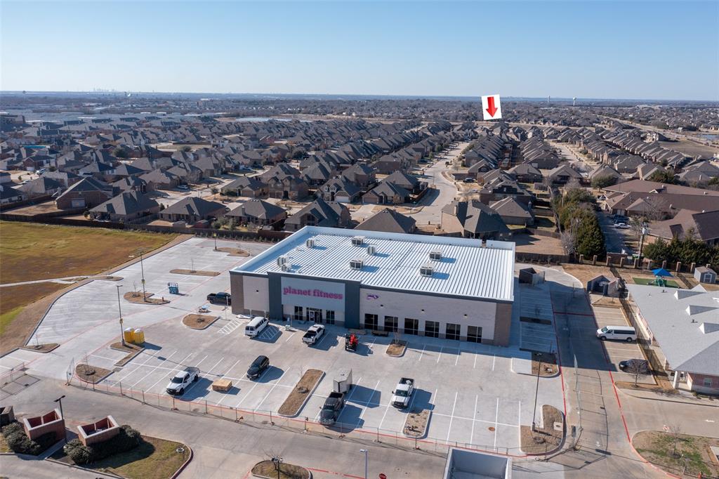 312 Eagle Ridge Road Forney, TX 75126 - Photo 36 of 39 an aerial view of a house with a ocean view