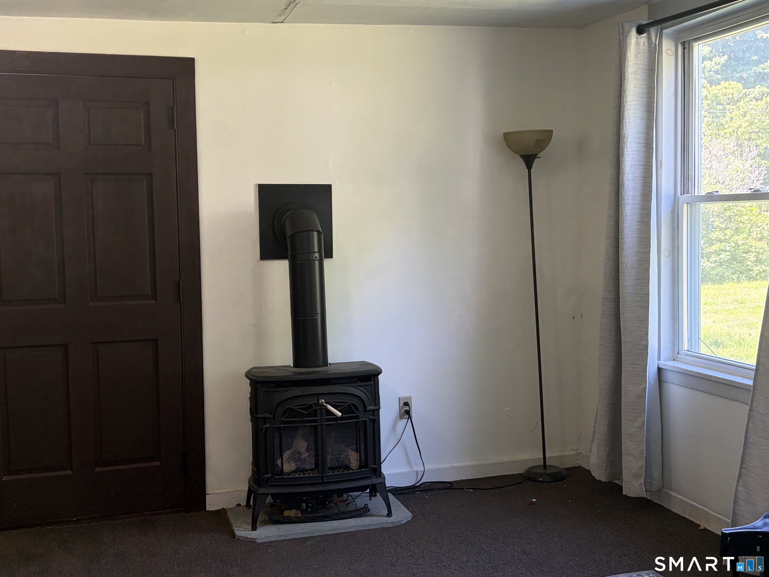 1079 Main Street Coventry, CT 06238 - Photo 7 of 19 a room with a door