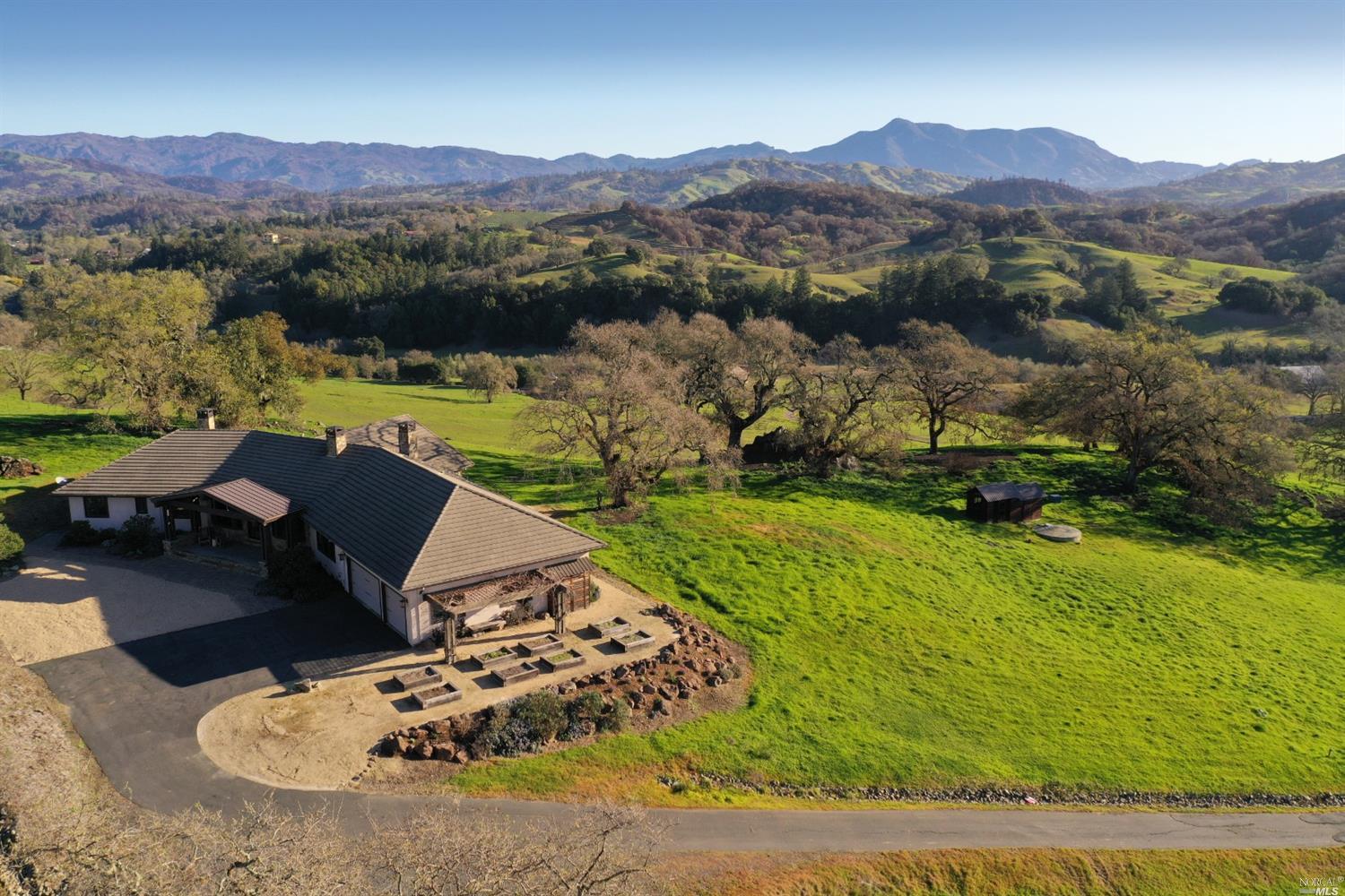 a view of a lake with mountain in the background