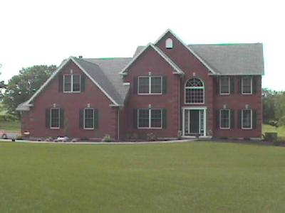 2823 Derhammer Road Bath, PA 18014 - Photo 1 of 6 a front view of a house with a yard