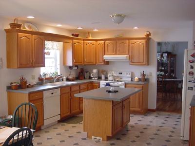 2823 Derhammer Road Bath, PA 18014 - Photo 2 of 6 a kitchen with a sink stove and cabinets