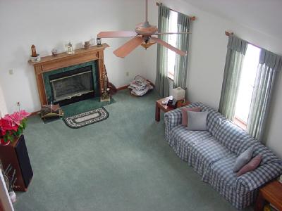 2823 Derhammer Road Bath, PA 18014 - Photo 6 of 6 a living room with furniture a window and a fireplace