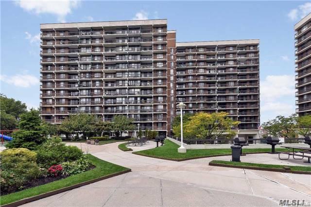 152-18 Union Turnpike, Unit 8F Queens, NY 11367 - Photo 3 of 10 a building view with outdoor space