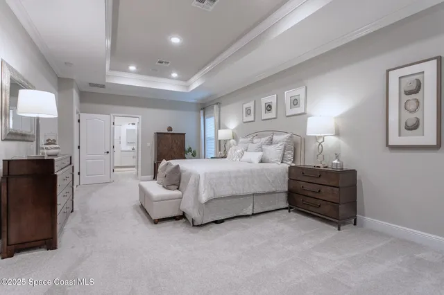 a bedroom with furniture and a couch