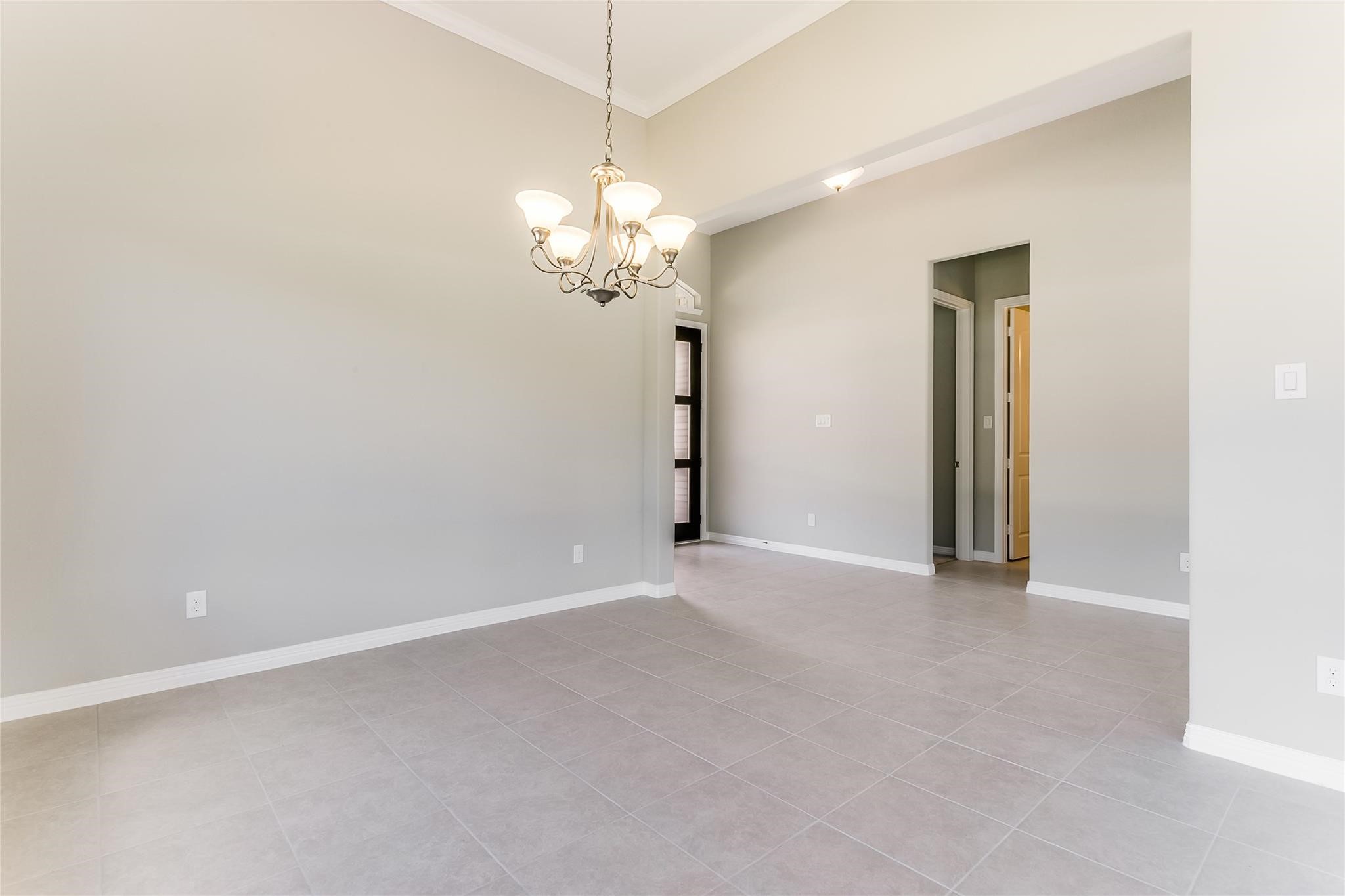 4227 Carol Ridge Drive Sugar Land, TX 77479 - Photo 12 of 35 an empty room with chandelier fan