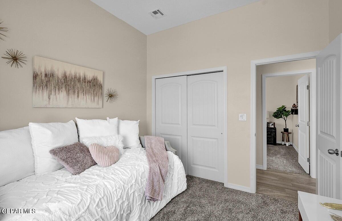 6923 Levee Circle Anthony, NM 88021 - Photo 24 of 44 a bed room with a bed and a view of bathroom