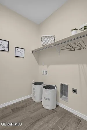 a bedroom with a bed and a mirror