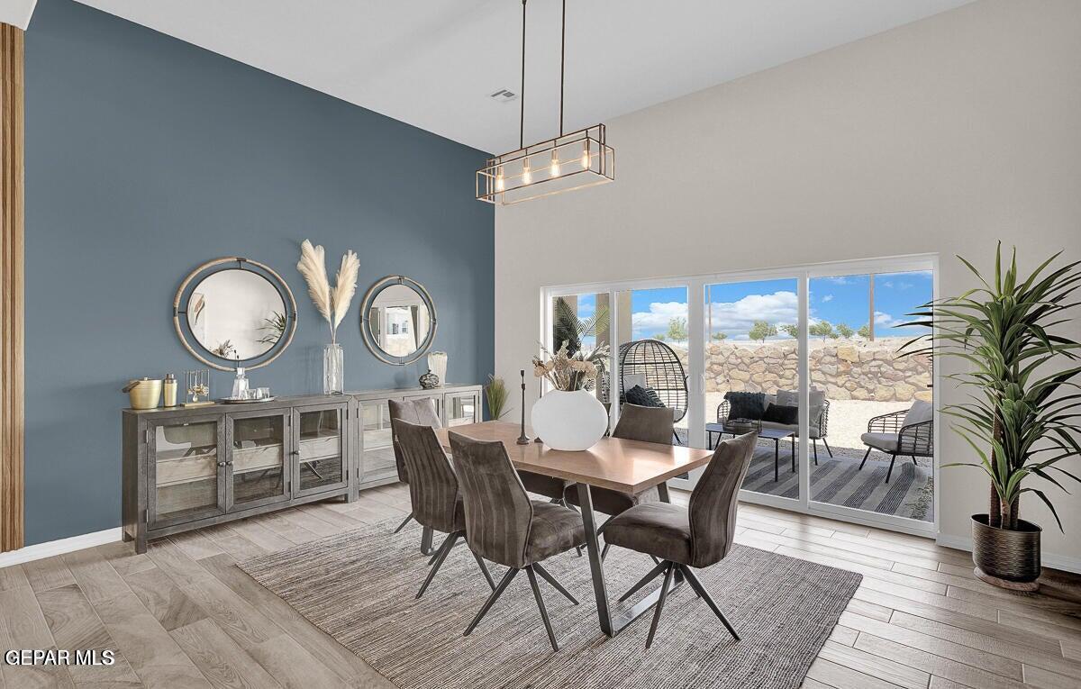 6923 Levee Circle Anthony, NM 88021 - Photo 5 of 44 a view of a dining room with furniture window and wooden floor
