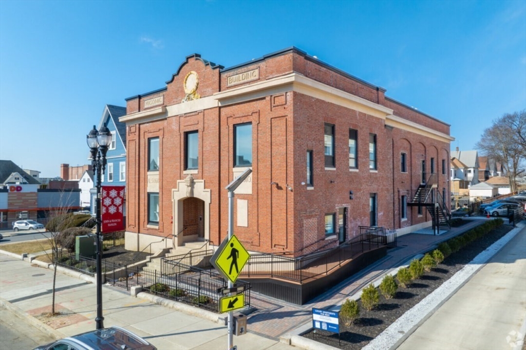 a front view of a building with street view