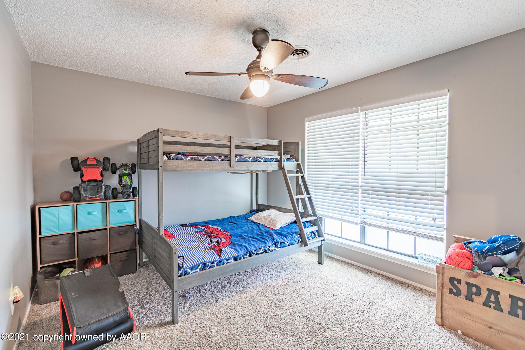 7306 Imperial Drive Amarillo, TX 79121 - Photo 14 of 24 a bedroom with a bed and a window