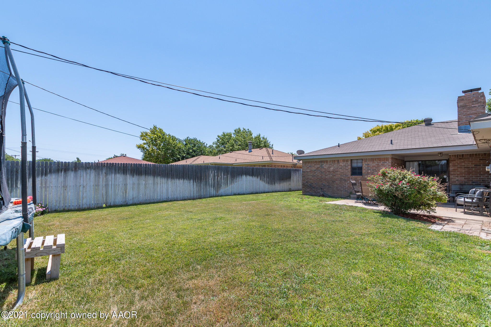 7306 Imperial Drive Amarillo, TX 79121 - Photo 23 of 24 a view of a back yard of the house