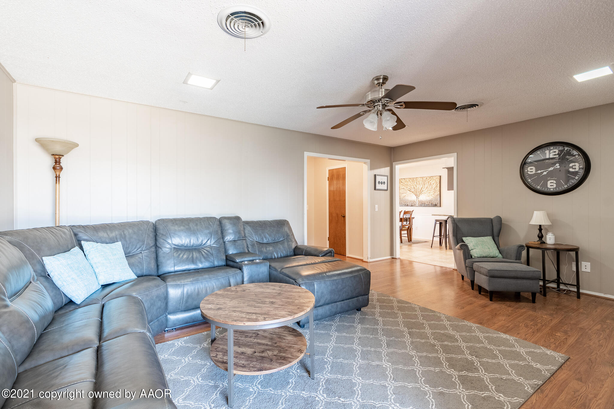 7306 Imperial Drive Amarillo, TX 79121 - Photo 10 of 24 a living room with furniture a rug and a window