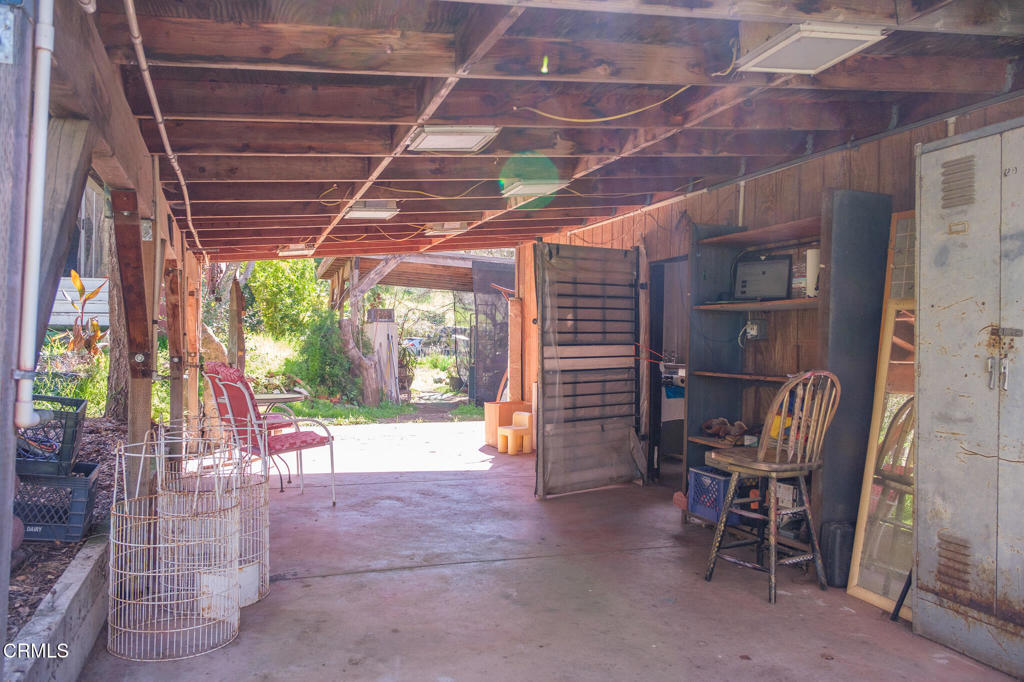8624 Nye Road Ventura, CA 93001 - Photo 14 of 39 a view of a room with wooden floor and outdoor space