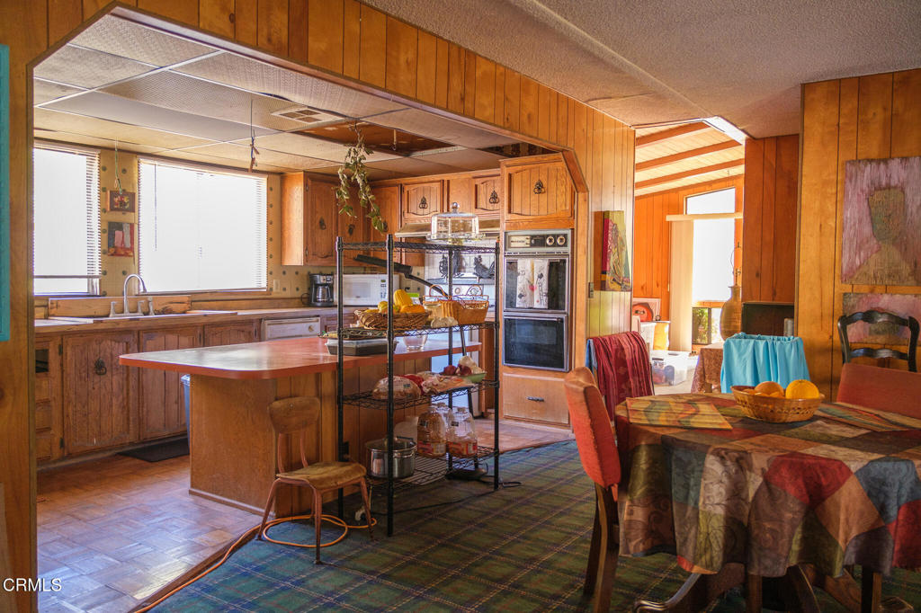 8624 Nye Road Ventura, CA 93001 - Photo 28 of 39 a view of a dining room with furniture and window