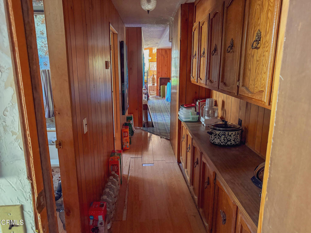 8624 Nye Road Ventura, CA 93001 - Photo 33 of 39 wooden floor in a gallery with wooden floor