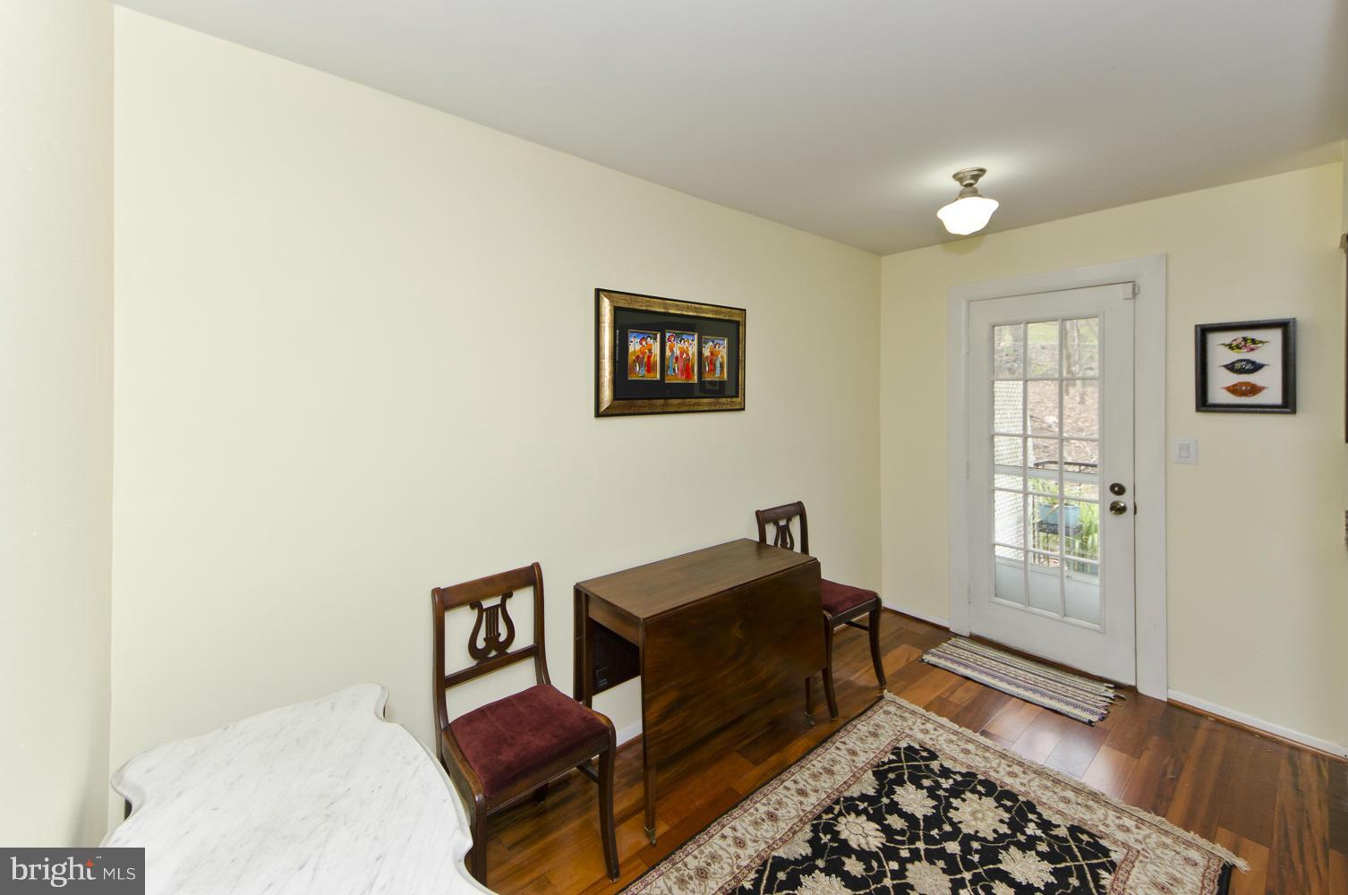 4647 28th Road South, Unit B Arlington, VA 22206 - Photo 4 of 20 a living room with furniture and a window