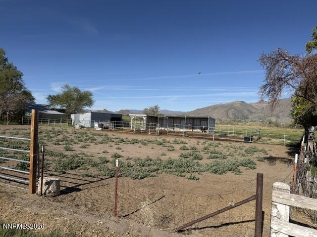 61 Rivers Road Smith, NV 89430 - Photo 48 of 57 a view of a dry yard with wooden fence