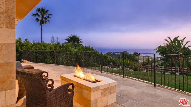 a view of a terrace with chairs