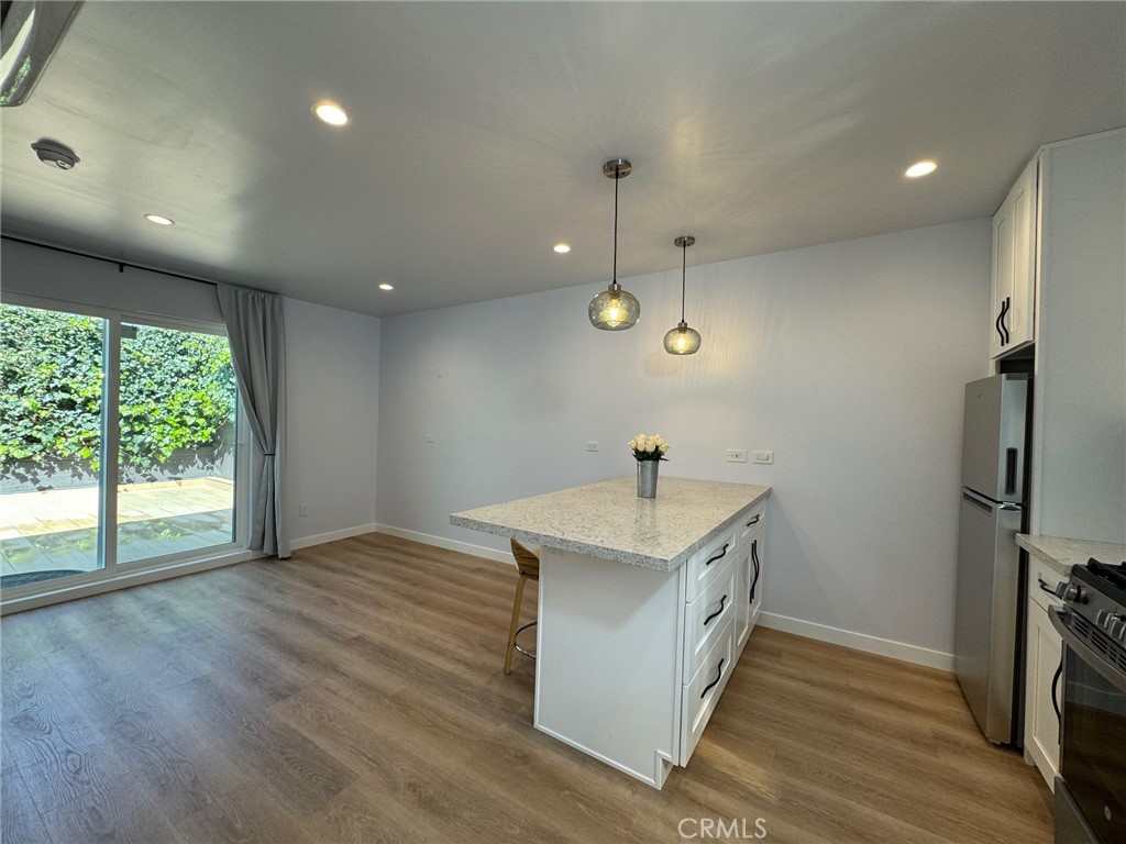 827 Delaware Road, Unit ADU Burbank, CA 91504 - Photo 5 of 20 wooden floor in an empty room with a window