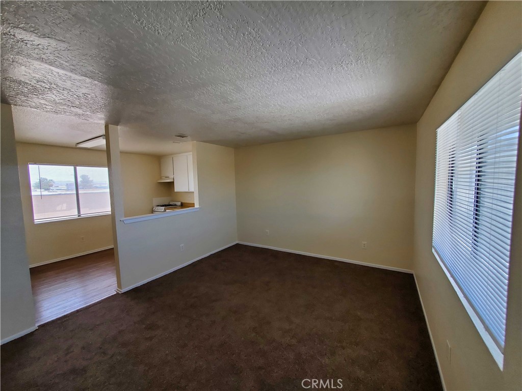 18000 Pearmain Street Adelanto, CA 92301 - Photo 11 of 14 a view of an empty room and a window