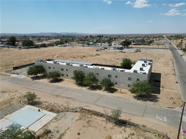 a bathroom with a sink toilet and mirror