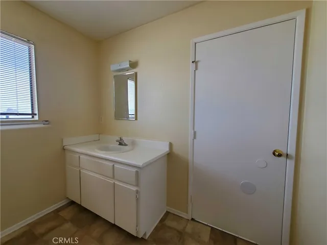 a bathroom with a tub and a shower