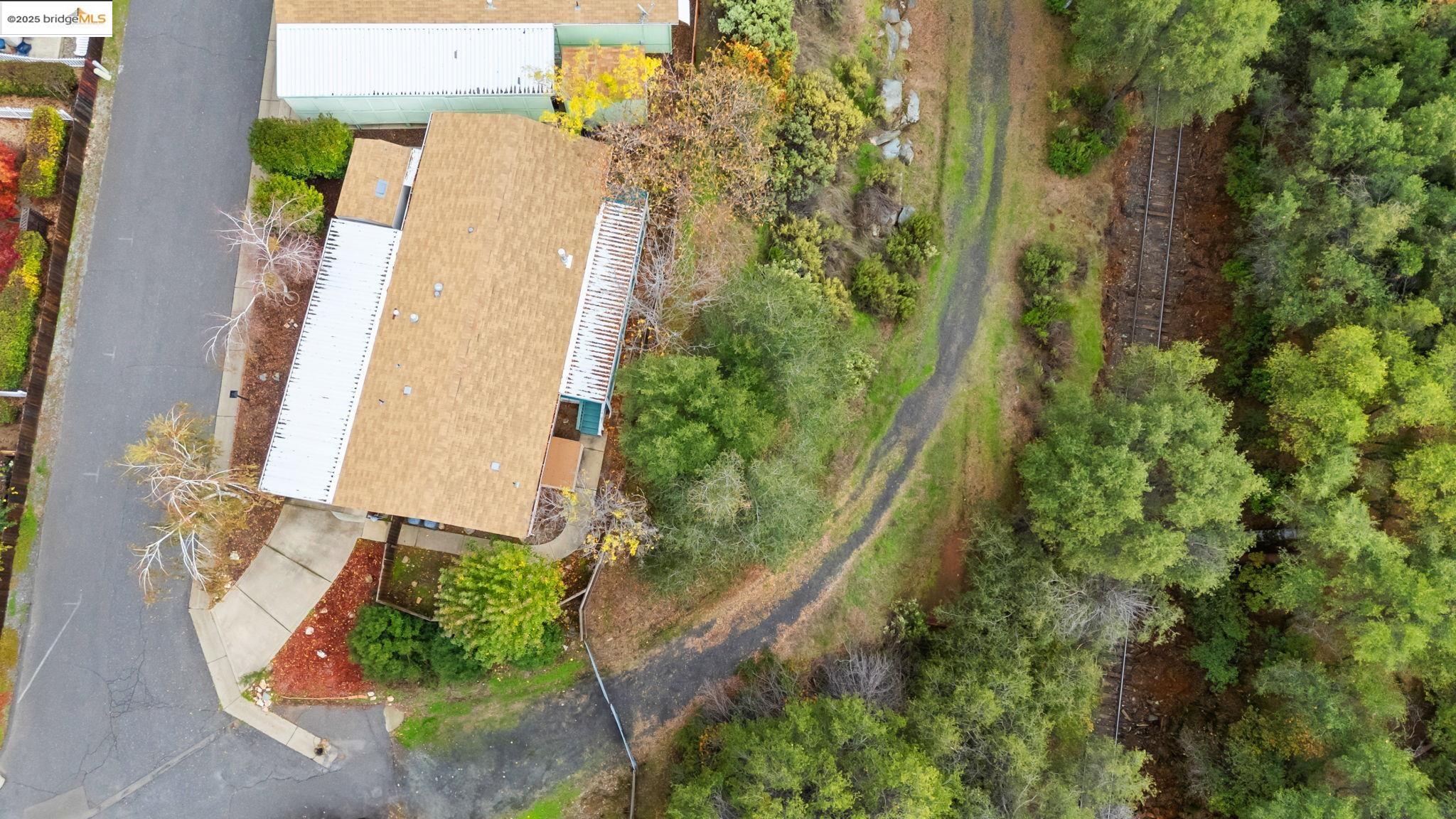 18717 Mill Villa Road, Unit 610 Jamestown, CA 95327 - Photo 26 of 35 an aerial view of a house with a yard