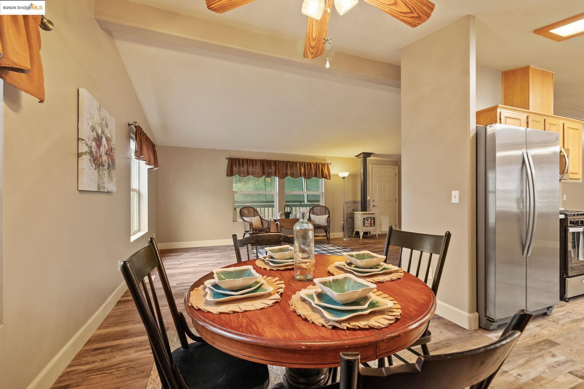 18717 Mill Villa Road, Unit 610 Jamestown, CA 95327 - Photo 7 of 35 a view of a dining room with furniture