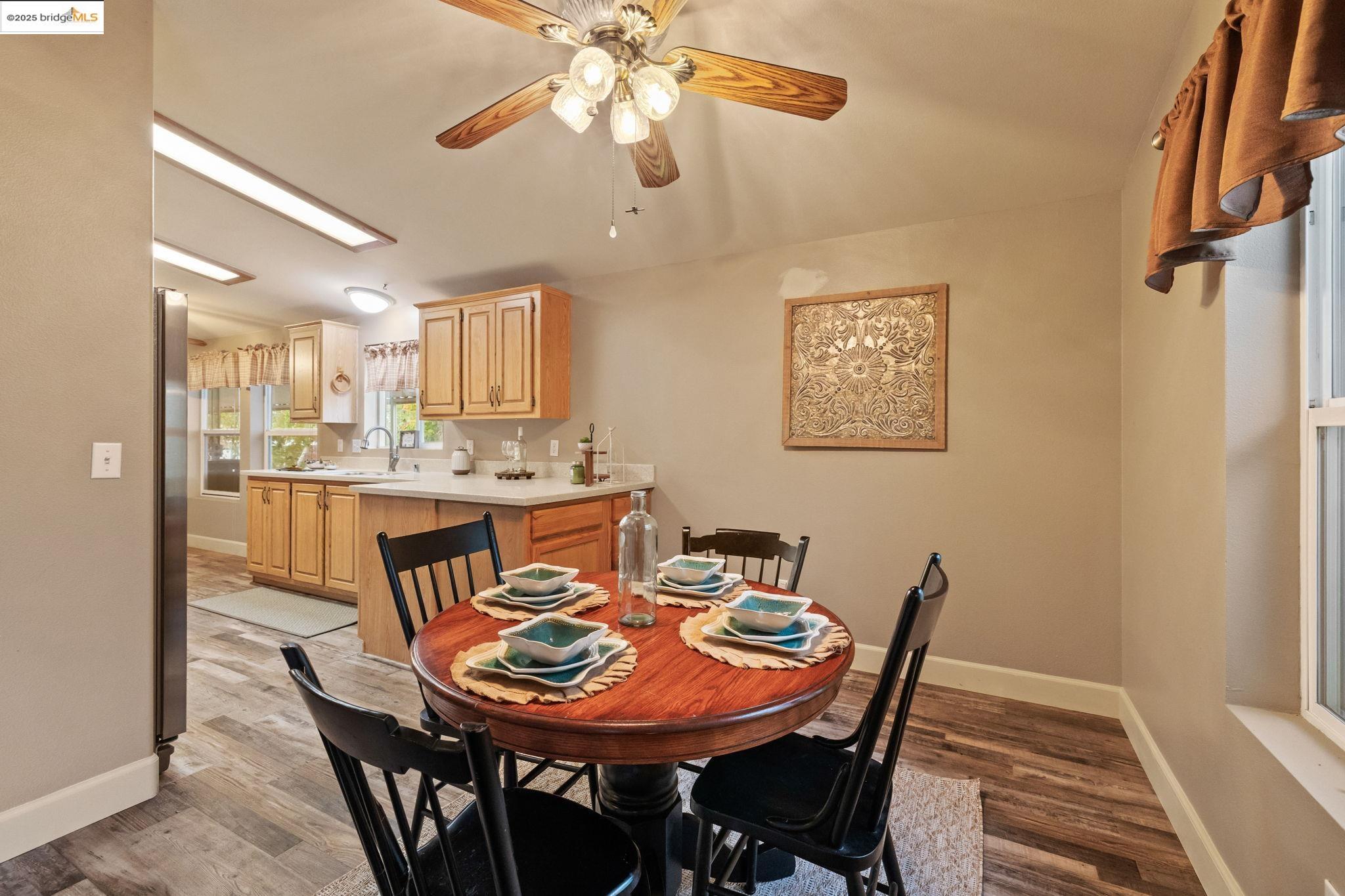 18717 Mill Villa Road, Unit 610 Jamestown, CA 95327 - Photo 8 of 35 a view of a dining room with furniture