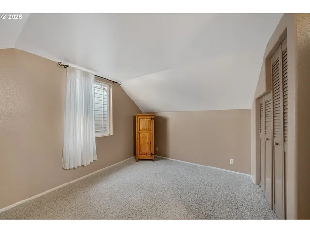 a view of a table and chairs in patio