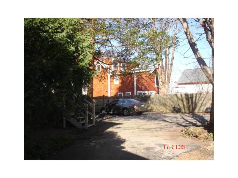 24 Peary Street, Unit C Newport, RI 02840 - Photo 17 of 17 Exterior Back. Parking