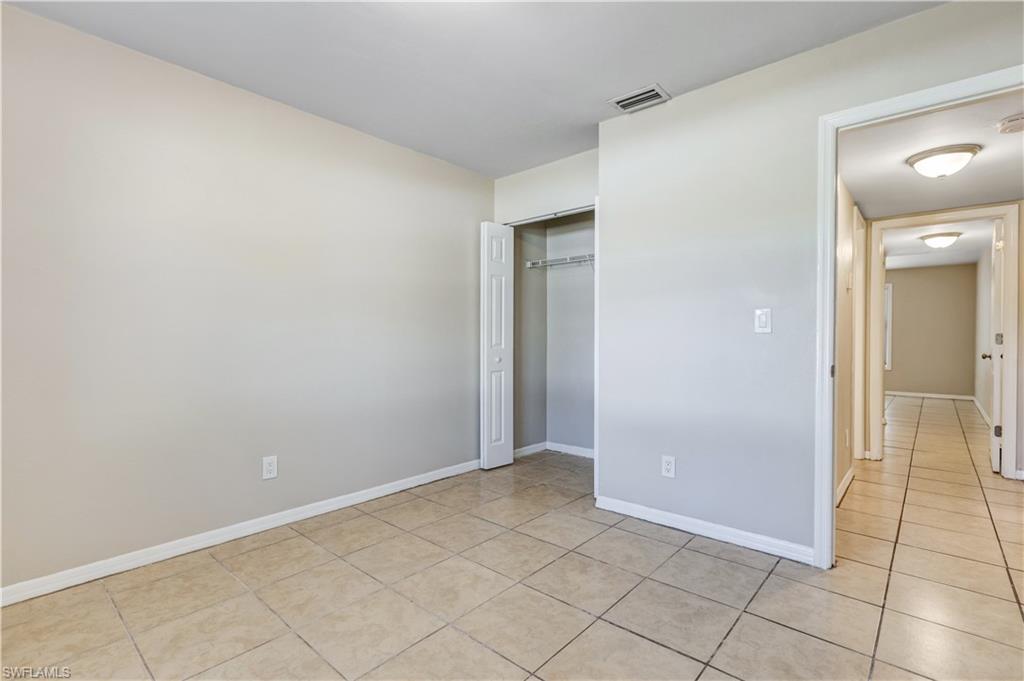 5453 16th Place Southwest Naples, FL 34116 - Photo 11 of 36 a view of an empty room