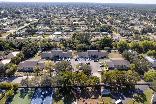 an aerial view of a city with lots of residential buildings