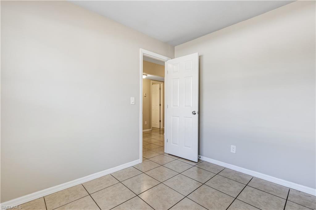 5453 16th Place Southwest Naples, FL 34116 - Photo 9 of 36 a view of an empty room