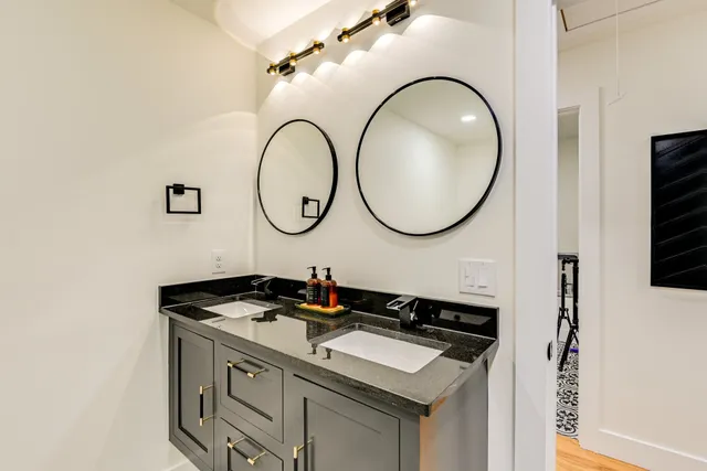 a bathroom with a bathtub and a sink