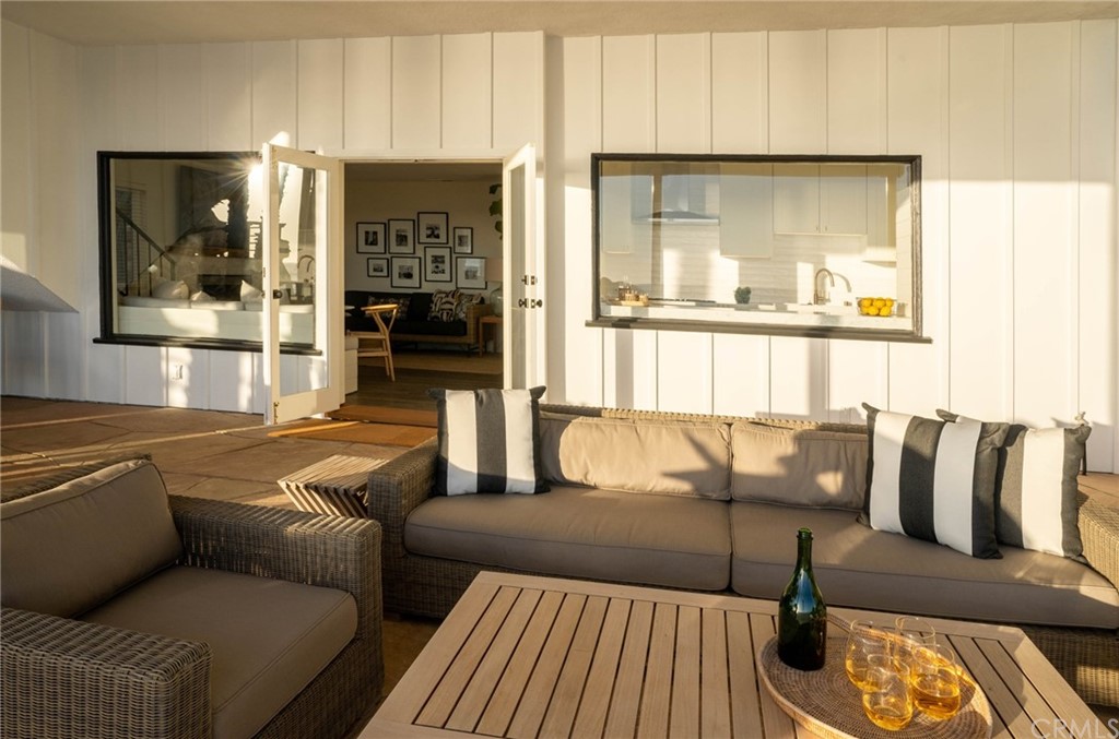 35581 Beach Road Dana Point, CA 92624 - Photo 6 of 23 a living room with furniture and a large window