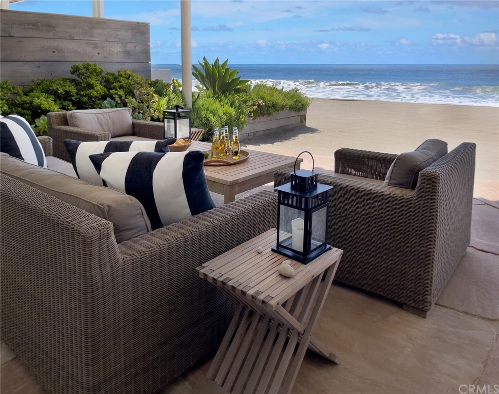 35581 Beach Road Dana Point, CA 92624 - Photo 7 of 23 a balcony with furniture and a potted plant