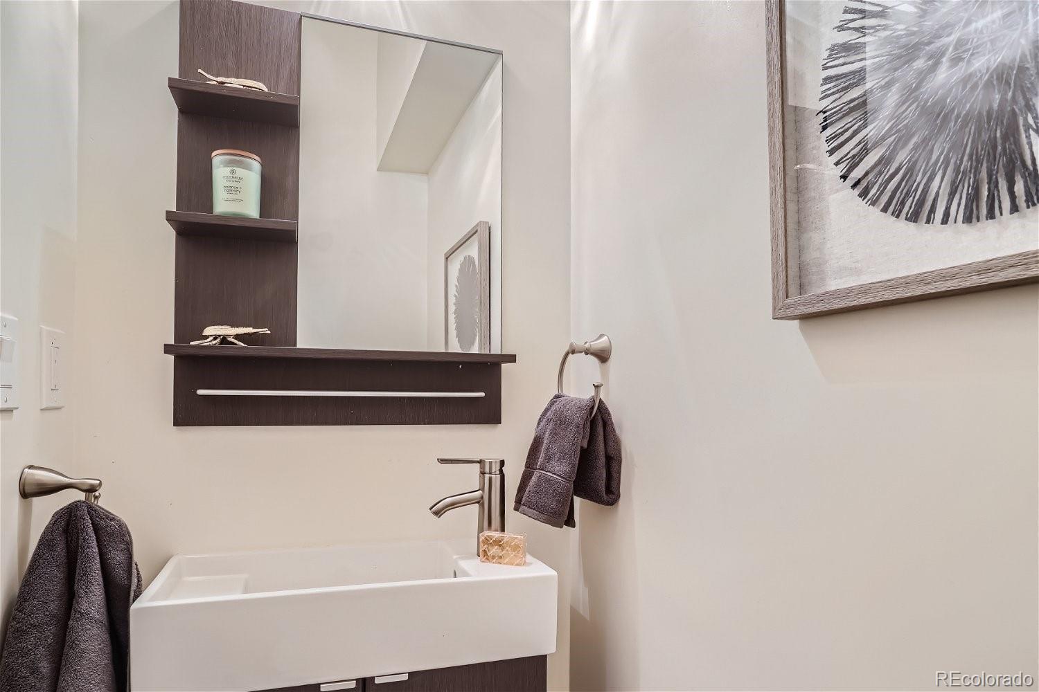 1516 Cook Street Denver, CO 80206 - Photo 11 of 35 a bathroom with a bathtub