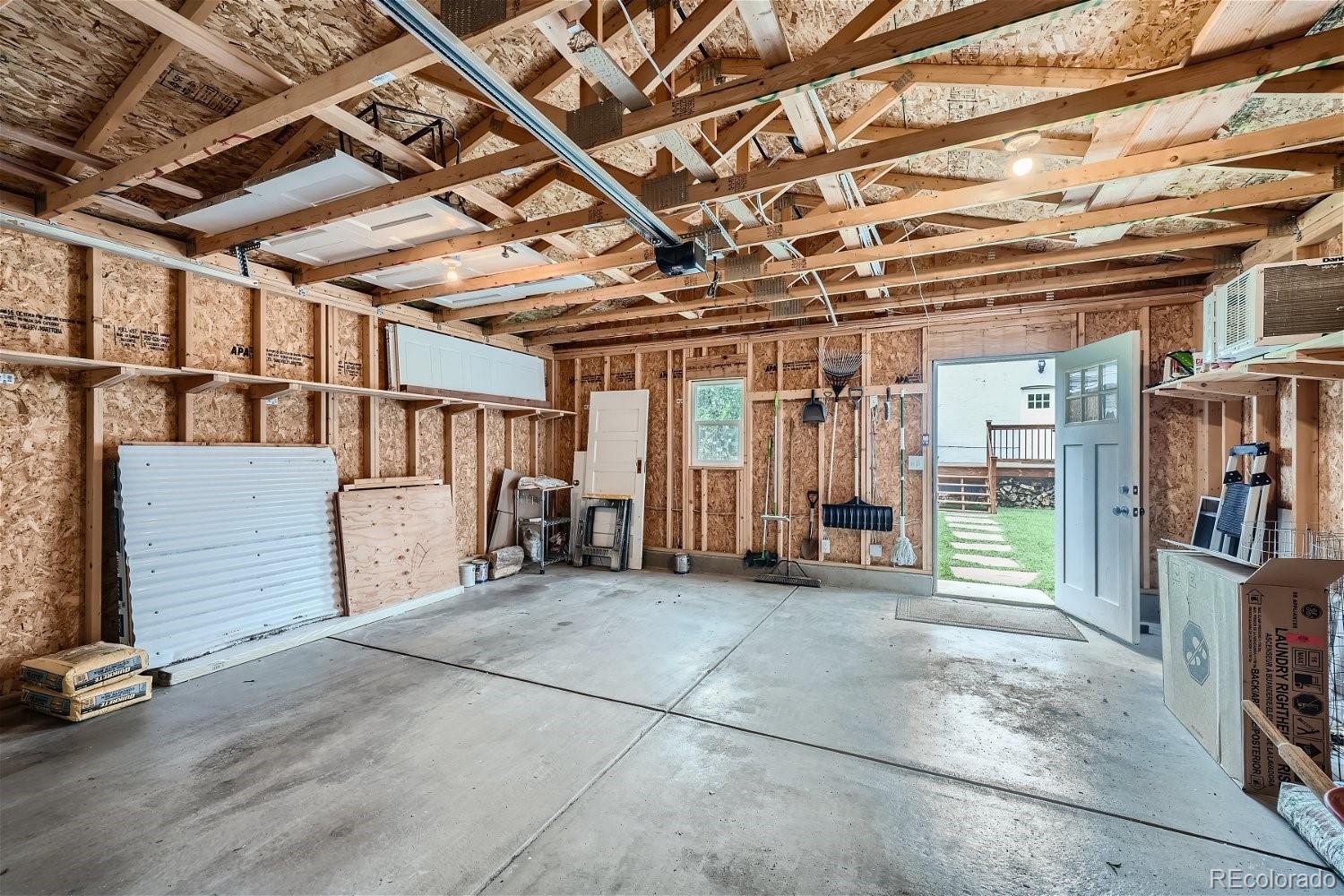1516 Cook Street Denver, CO 80206 - Photo 30 of 35 a view of a room with wooden walls