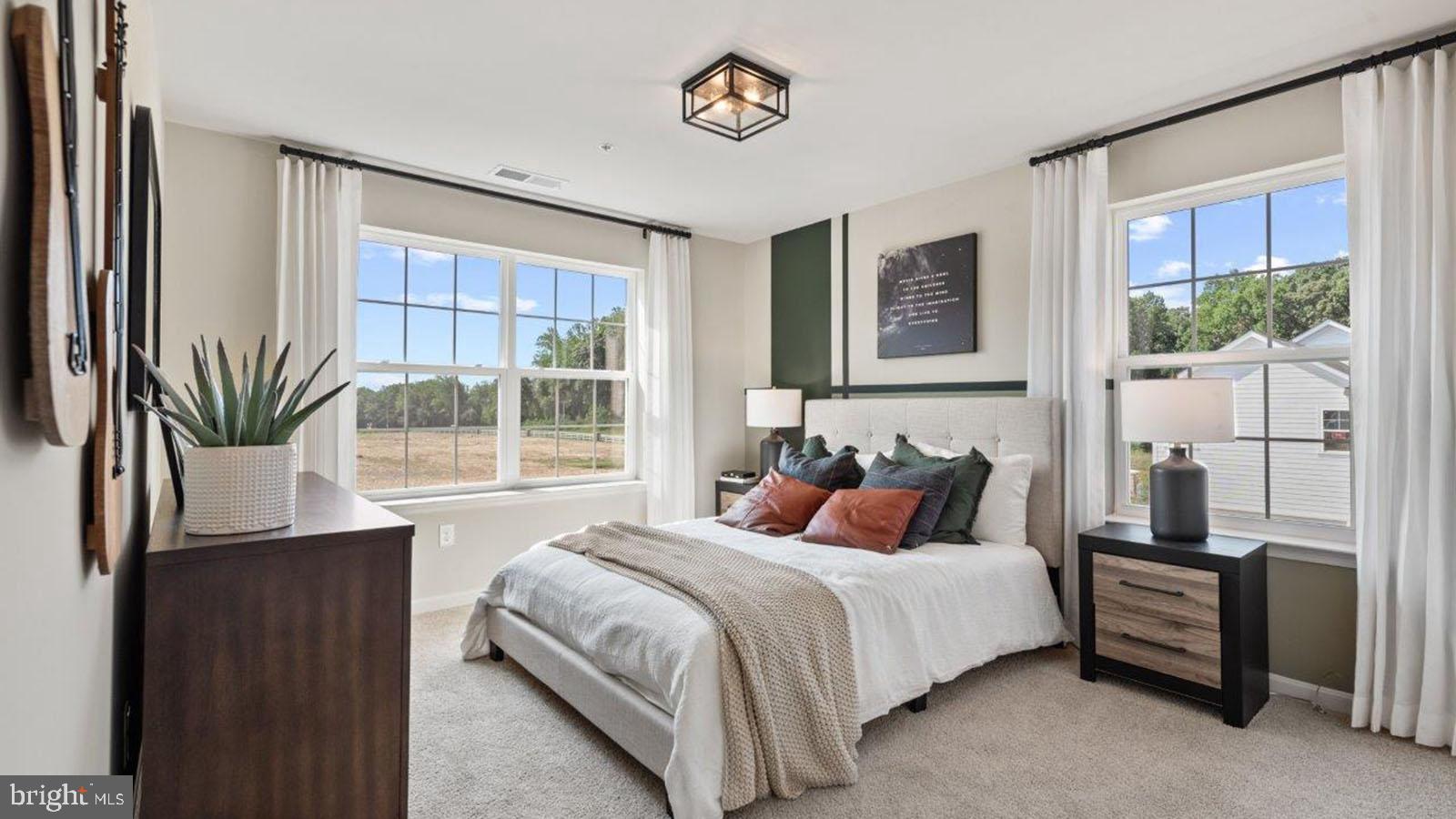 2 Comes Rdg Court Rosedale, MD 21237 - Photo 15 of 29 a bedroom with a large bed and a window