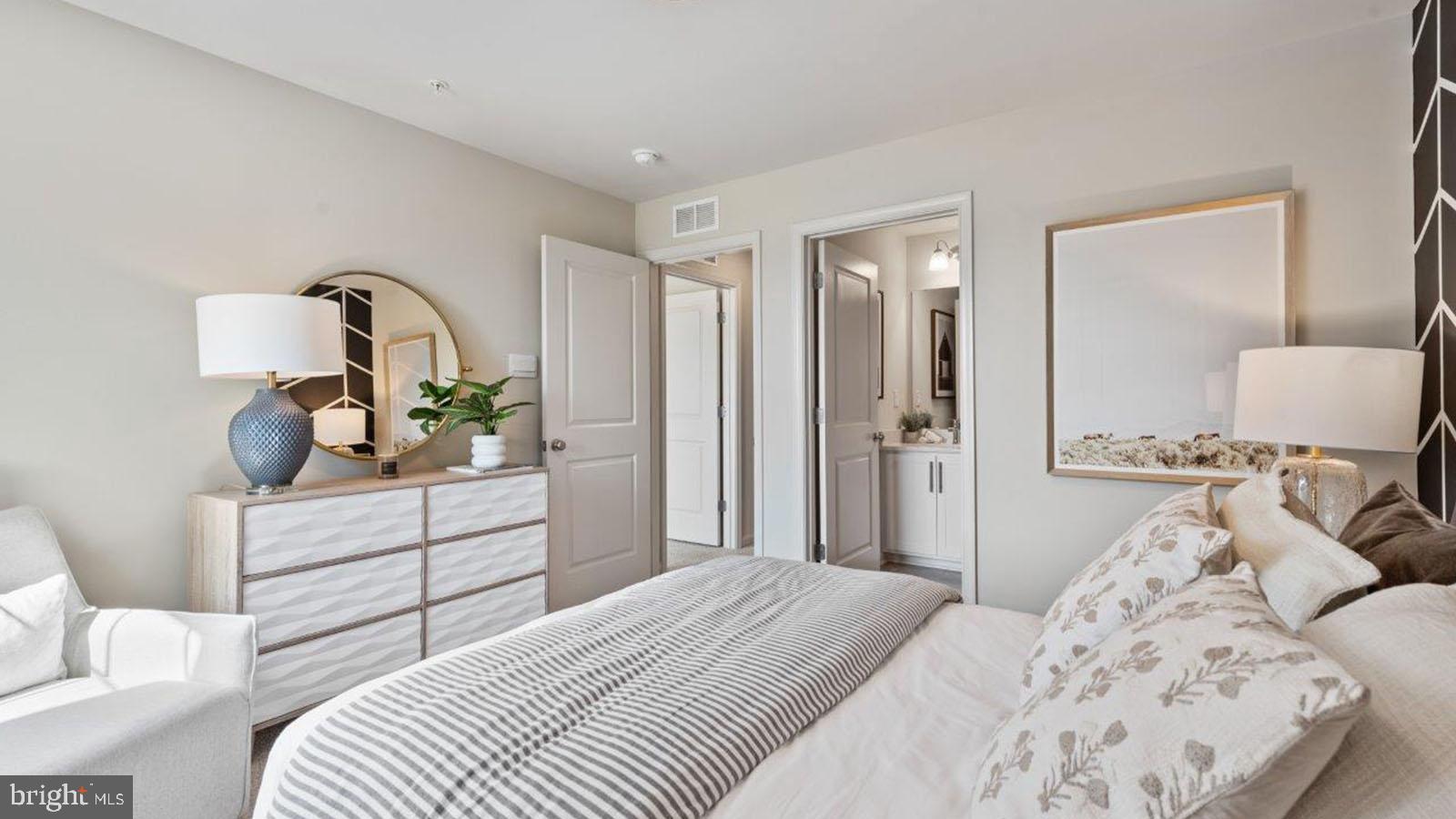 2 Comes Rdg Court Rosedale, MD 21237 - Photo 19 of 29 a bedroom with a bed and a dresser