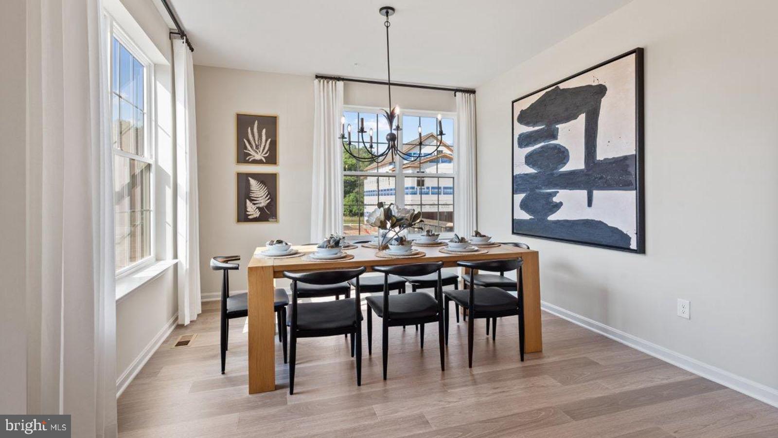 2 Comes Rdg Court Rosedale, MD 21237 - Photo 2 of 29 a view of a dining room with furniture window and wooden floor