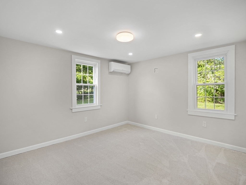 210 John Dyer Road Little Compton, RI 02837 - Photo 18 of 42 an empty room with a window