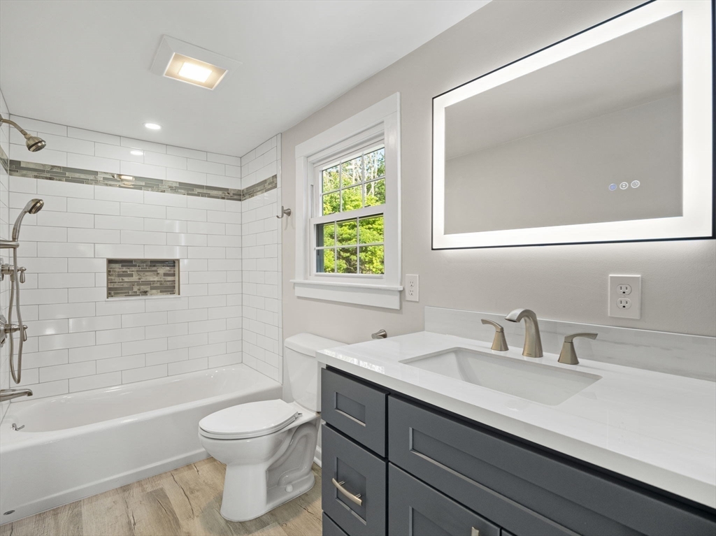 210 John Dyer Road Little Compton, RI 02837 - Photo 21 of 42 a bathroom with a sink a toilet and shower