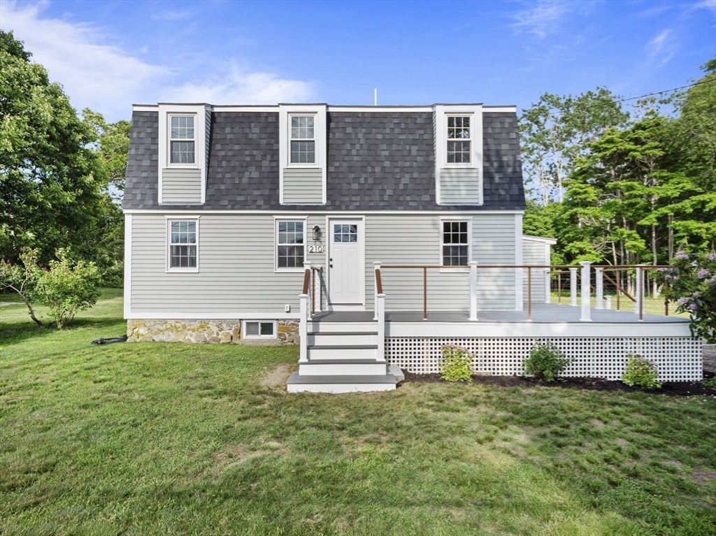 210 John Dyer Road Little Compton, RI 02837 - Photo 33 of 42 front view of a house with a yard
