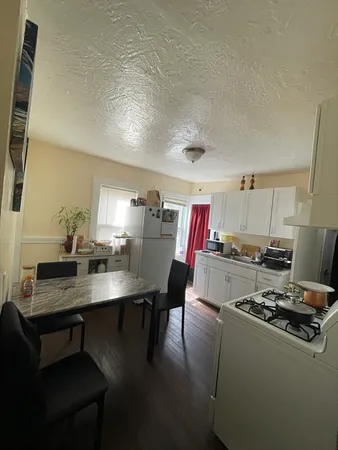a view of kitchen with breakfast area