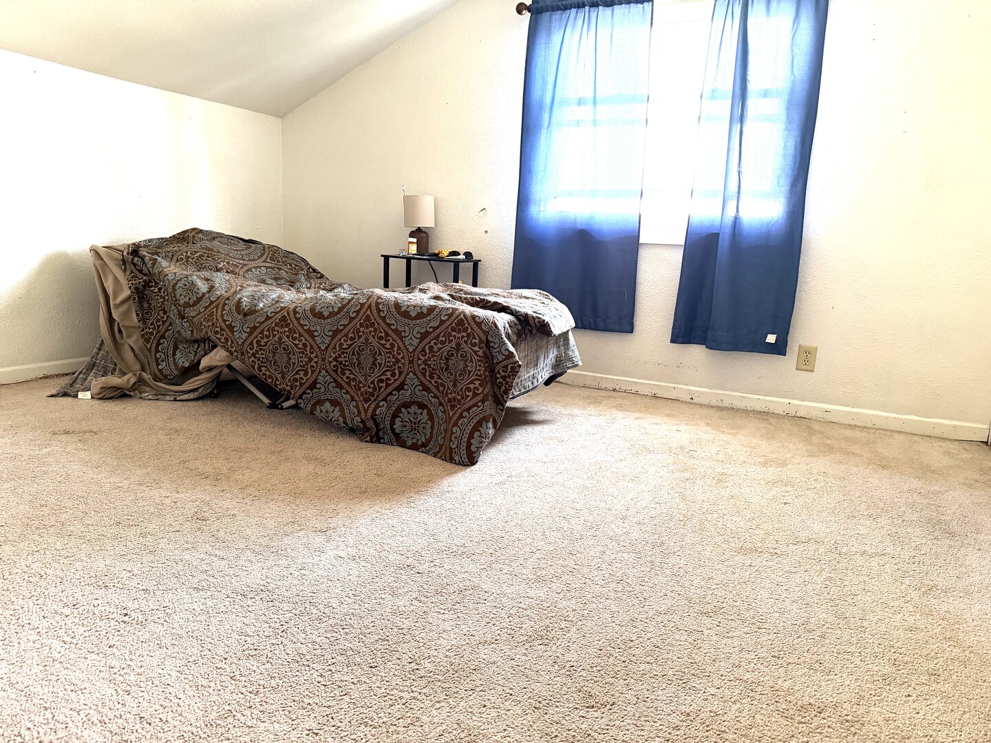504 11th Avenue Mendota, IL 61342 - Photo 7 of 15 a spacious bedroom with a bed and wooden floor