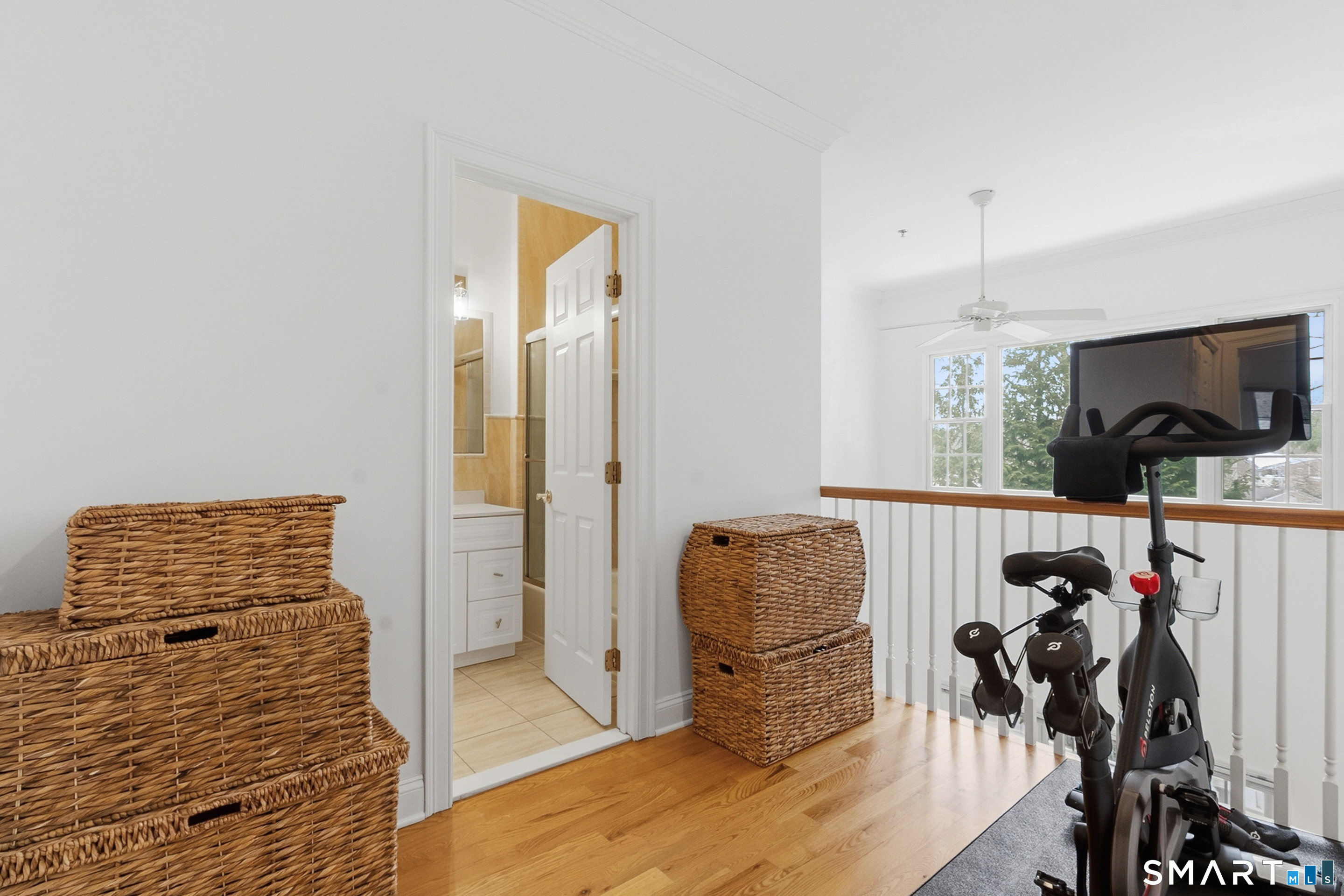 20 Cross Street, Unit 3 Westport, CT 06880 - Photo 12 of 20 a view of walk in closet with clothes and shoes